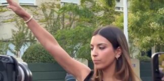 Saluto nazista davanti all’ambasciata del Marocco a Madrid, chi è l’attivista 24enne virale sui social
